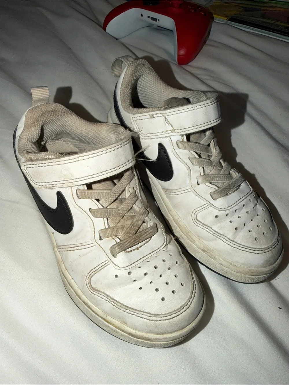 Nike Kids White Sneakers with Black Swoosh and Tan Laces